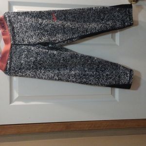 Girls size XL off white and black with pink waist band Nike pro Capri leggins